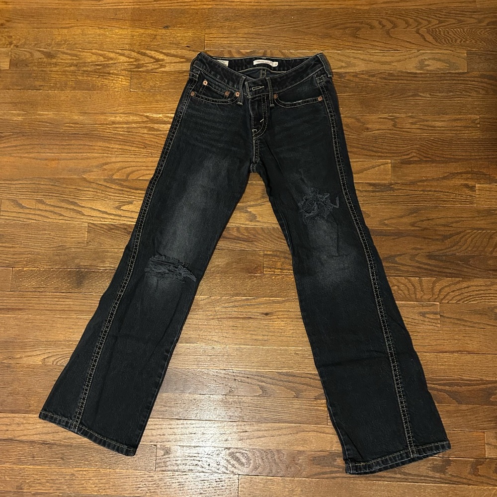 Levi’s distressed noughties bootcut denim